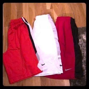 3 adult small/ kid large Nike shorts